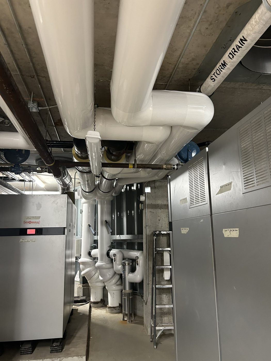 Insulated overhead runs in a mechanical room