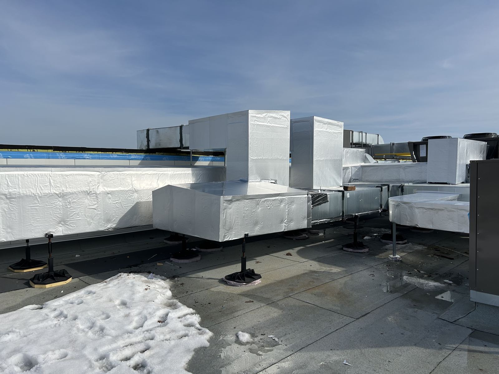 Insulated rooftop ductwork in winter