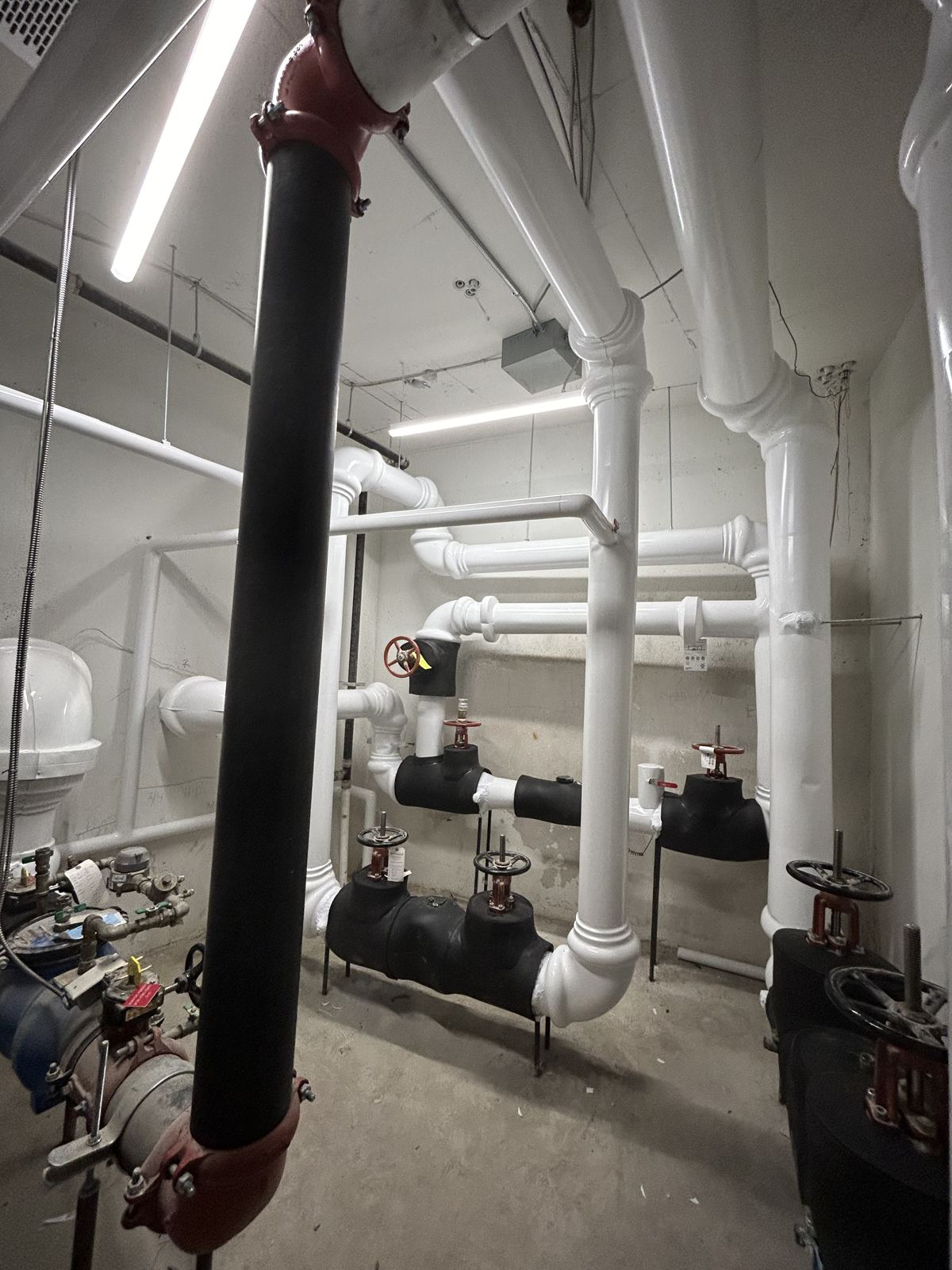 Insulated risers and mains in a boiler room